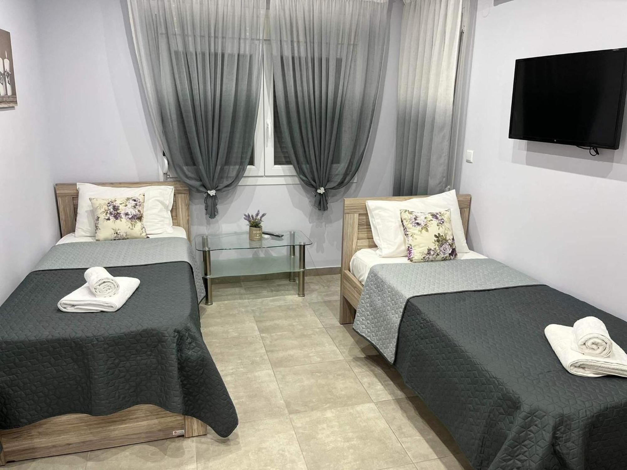 Apartmán Kaiafas Luxury Philoxenia Néa Péramos Pokoj fotografie